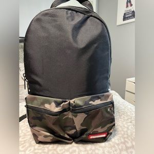 Spray ground backpack
